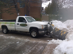 A snow pusher truck removing snow