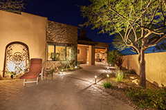 Landscape Lighting In The Backyard of a House